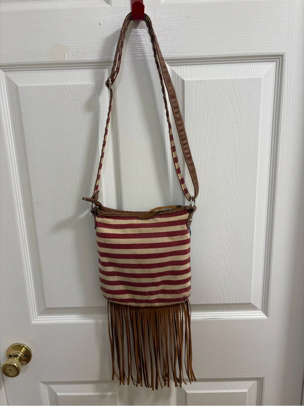 Retro crossbody Stars and Stripes bag with fringe, note striped underside strap